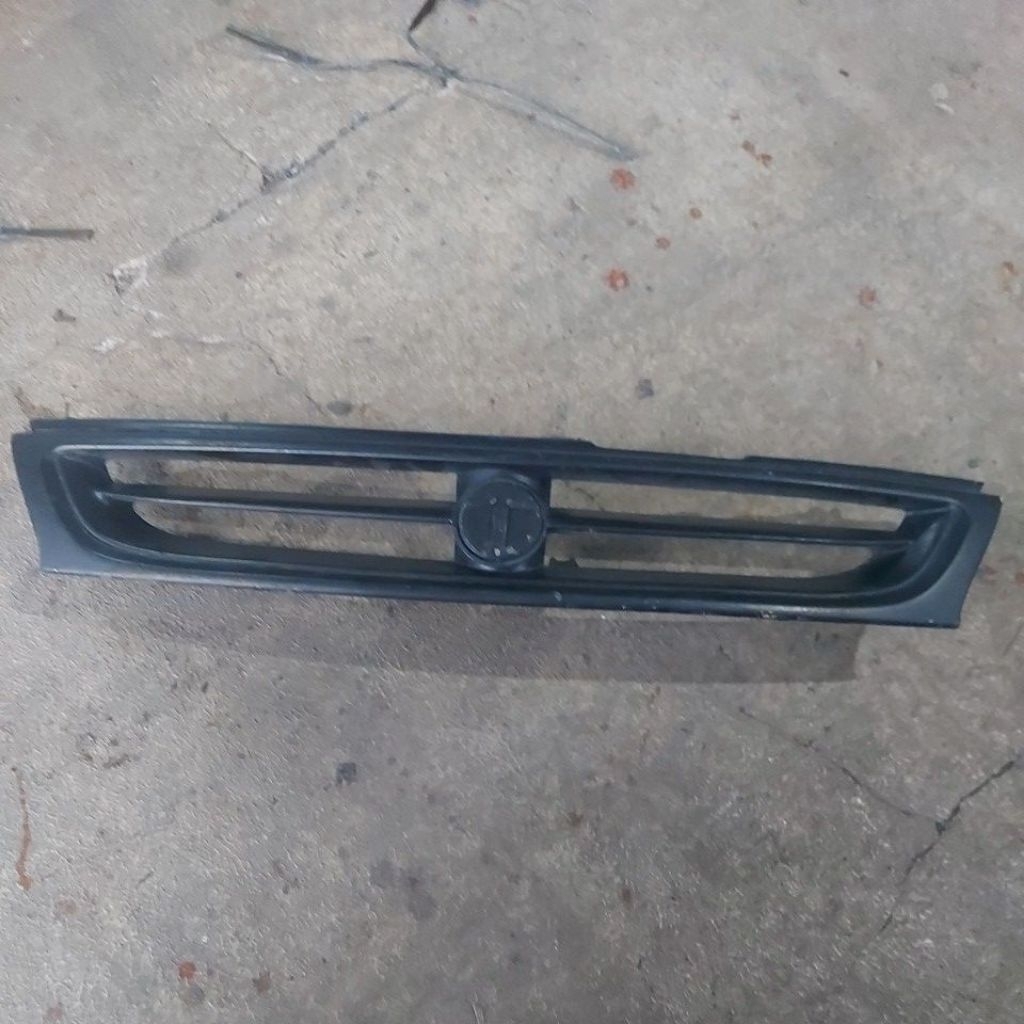 Gril bumper gril bemper depan mobil timor timor original