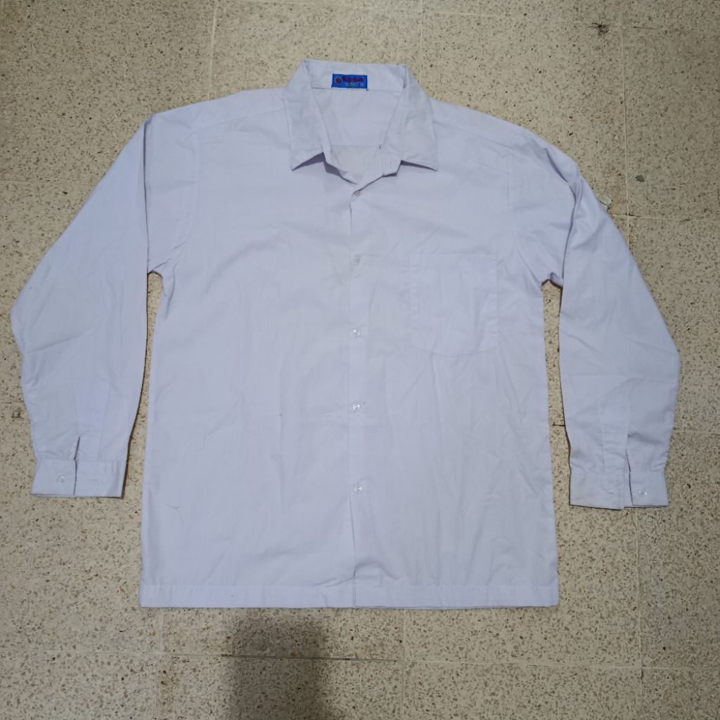 PL baju sekolah putih merk seragam / pluto 6