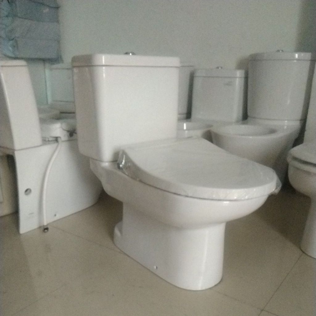 TOTO OMNI Kloset duduk Toto Cw 860 - SW 861 JP Dengan tutup otomatis ecowaser second original 100% j