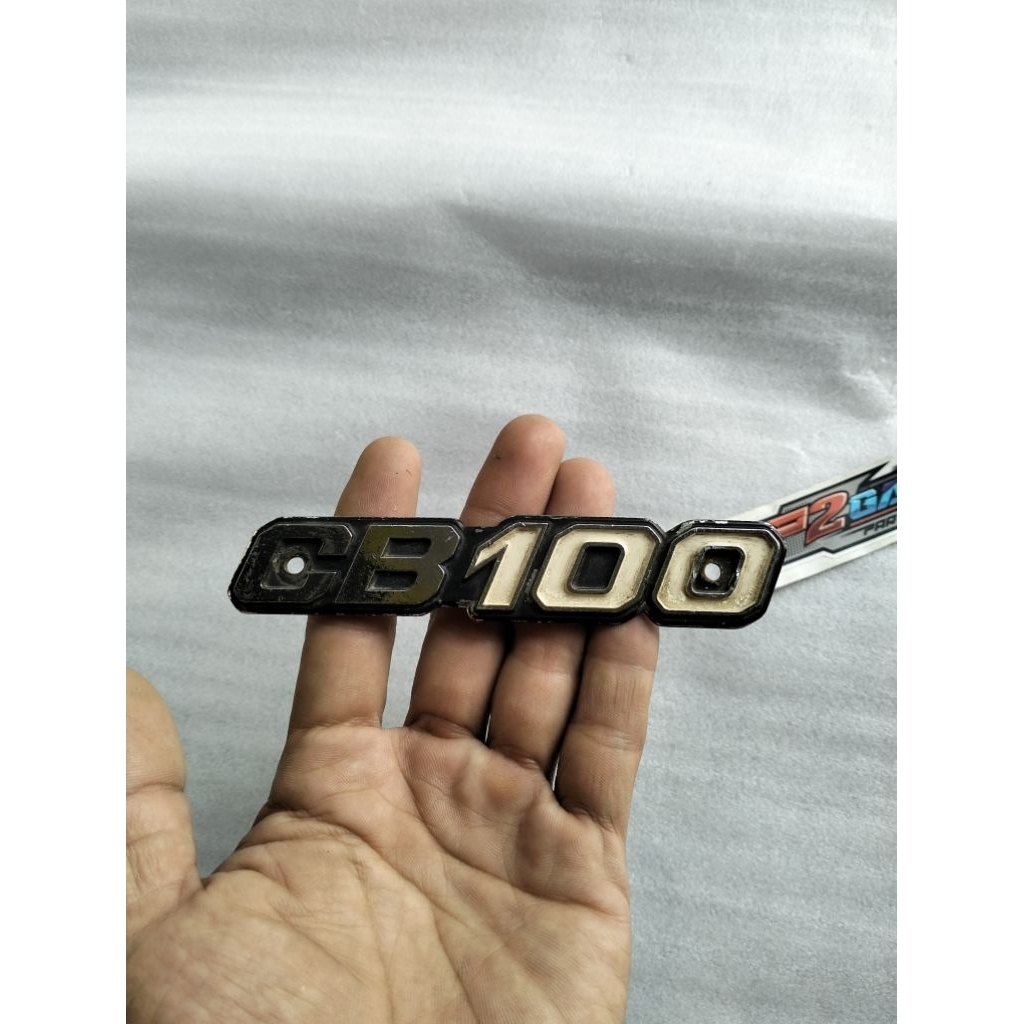 Emblem tepong aki cover aki cb100 cb k5 bagong original