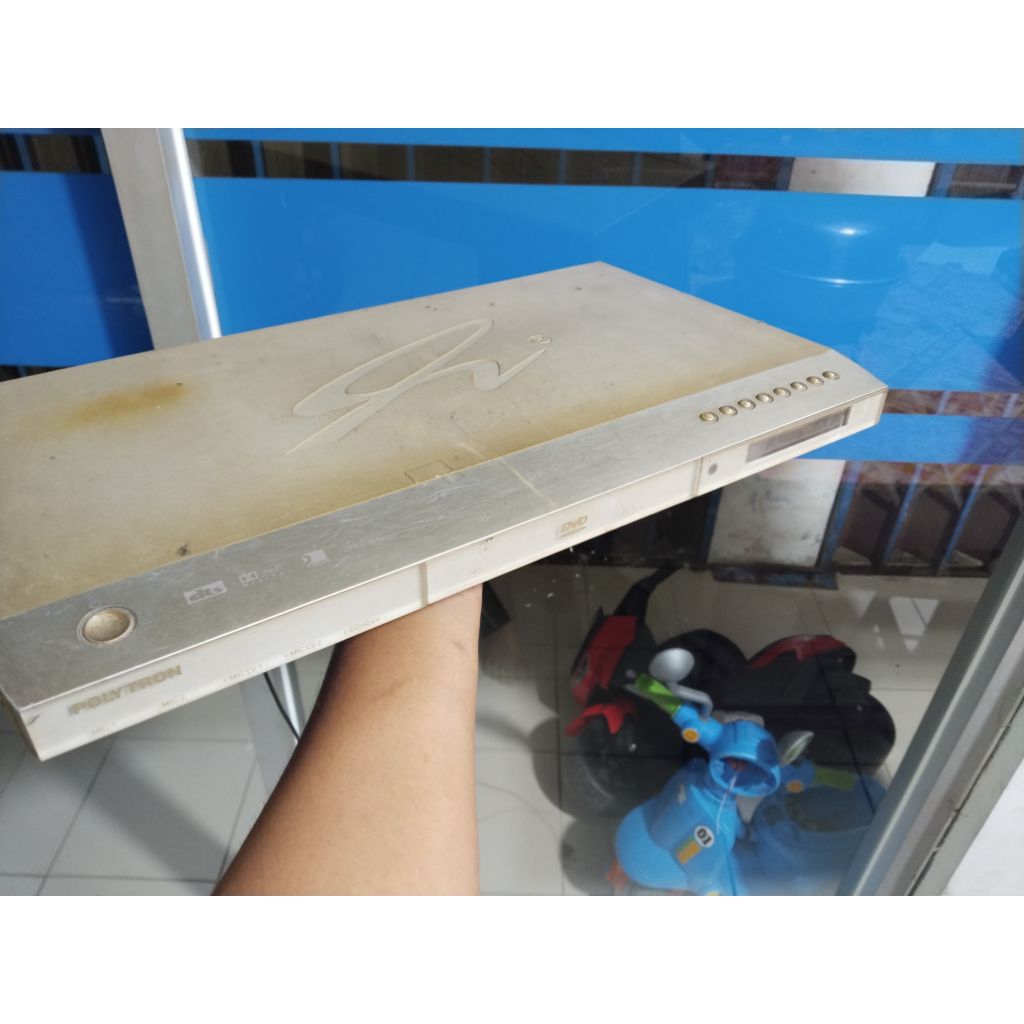 pemutar musik dividi polytron butuh servis