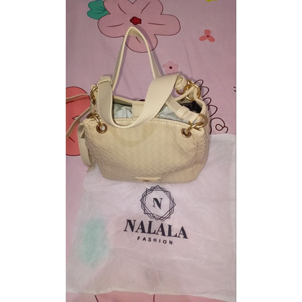 nalala tas