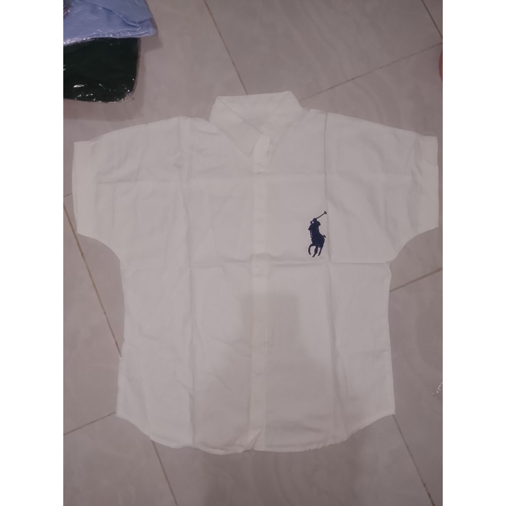 KEMEJA POLO LENGAN PENDEK