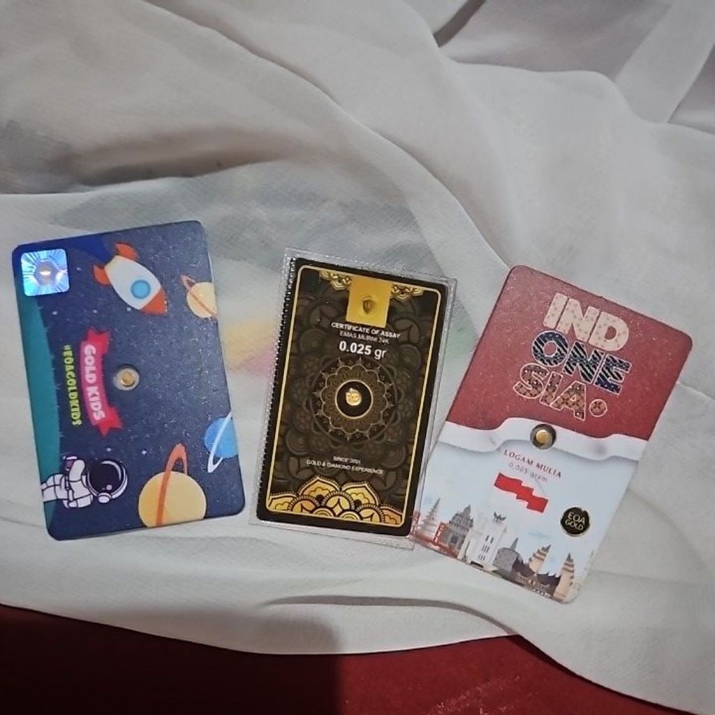 1 paket (EOA GOLD SERIES ( KIDS Astronot, ,INDONESIA ) 0,005 Gram )dan FINE GOLD 0.025 Gram