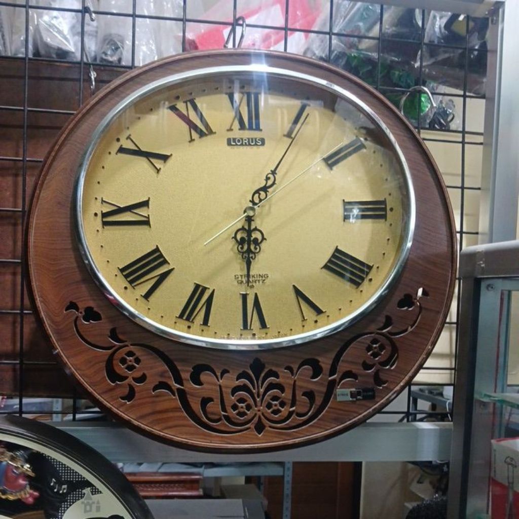 Jam Dinding Lorus Striking Quartz