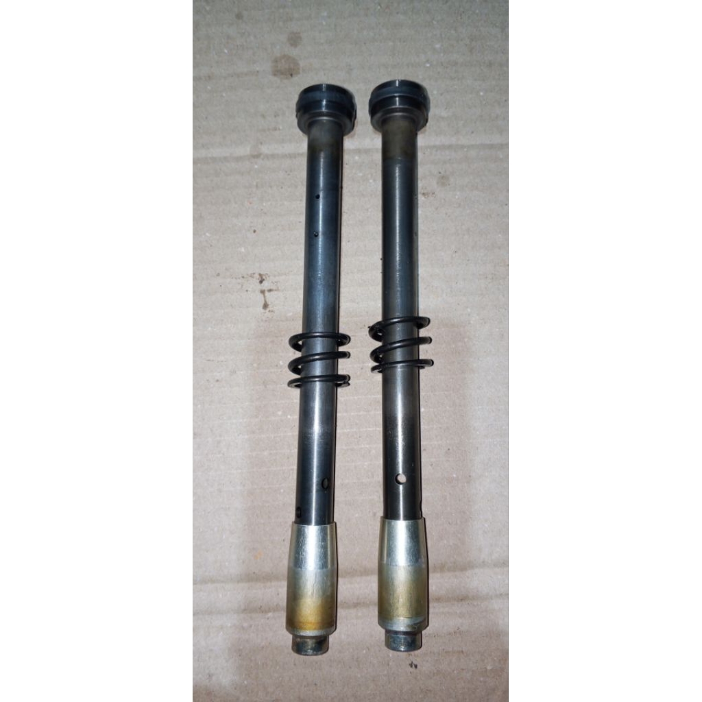 sulingan shock dpn tiger revo ori copotan