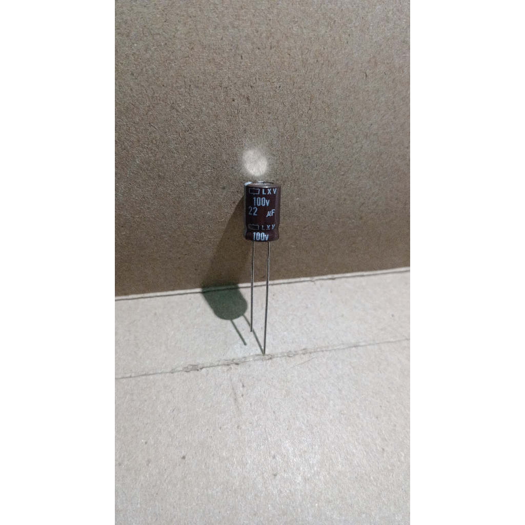 7289 kapasitor elco 22uf 22 uf 100v 100volt 100 volt nippon chemicon