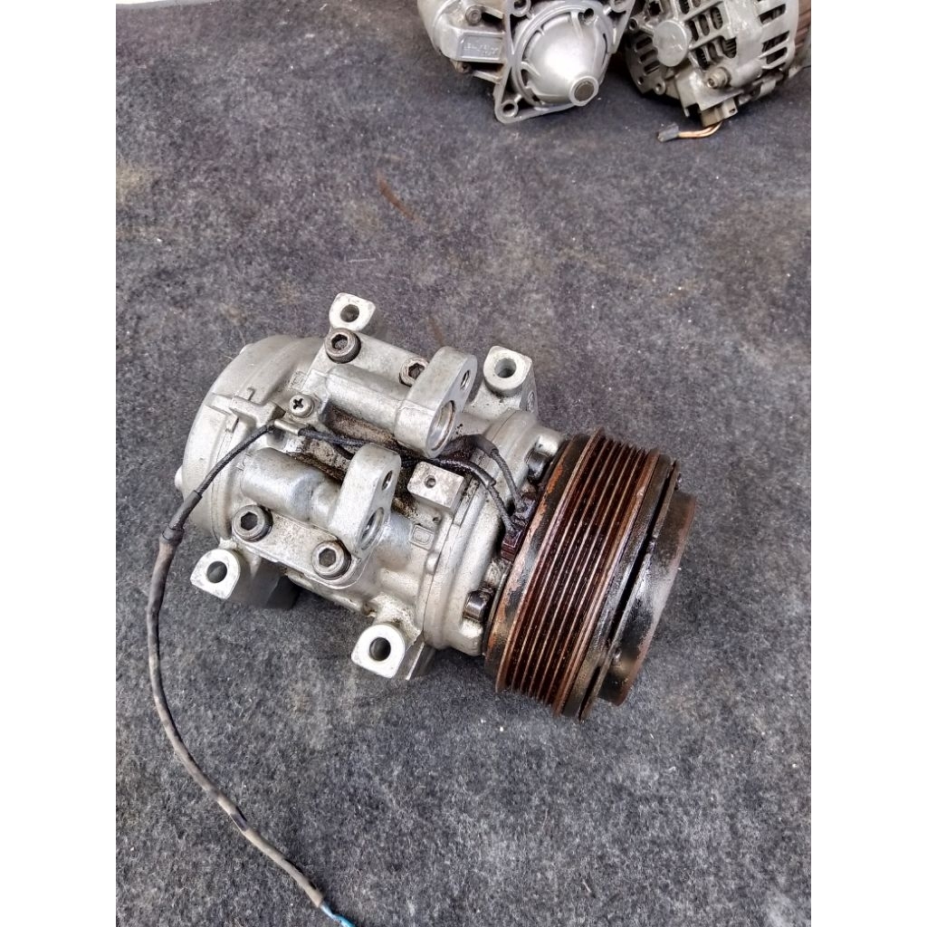 Kompresor Ac Ford Laser Champ