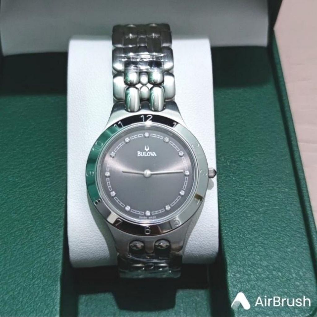 Jam tangan Bulova vintage black dial stainless steel strap