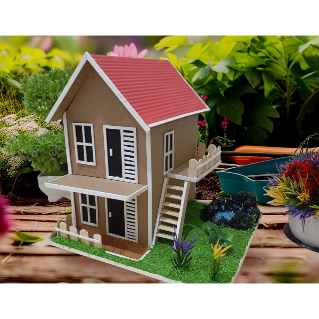 miniatur rumah kardus.