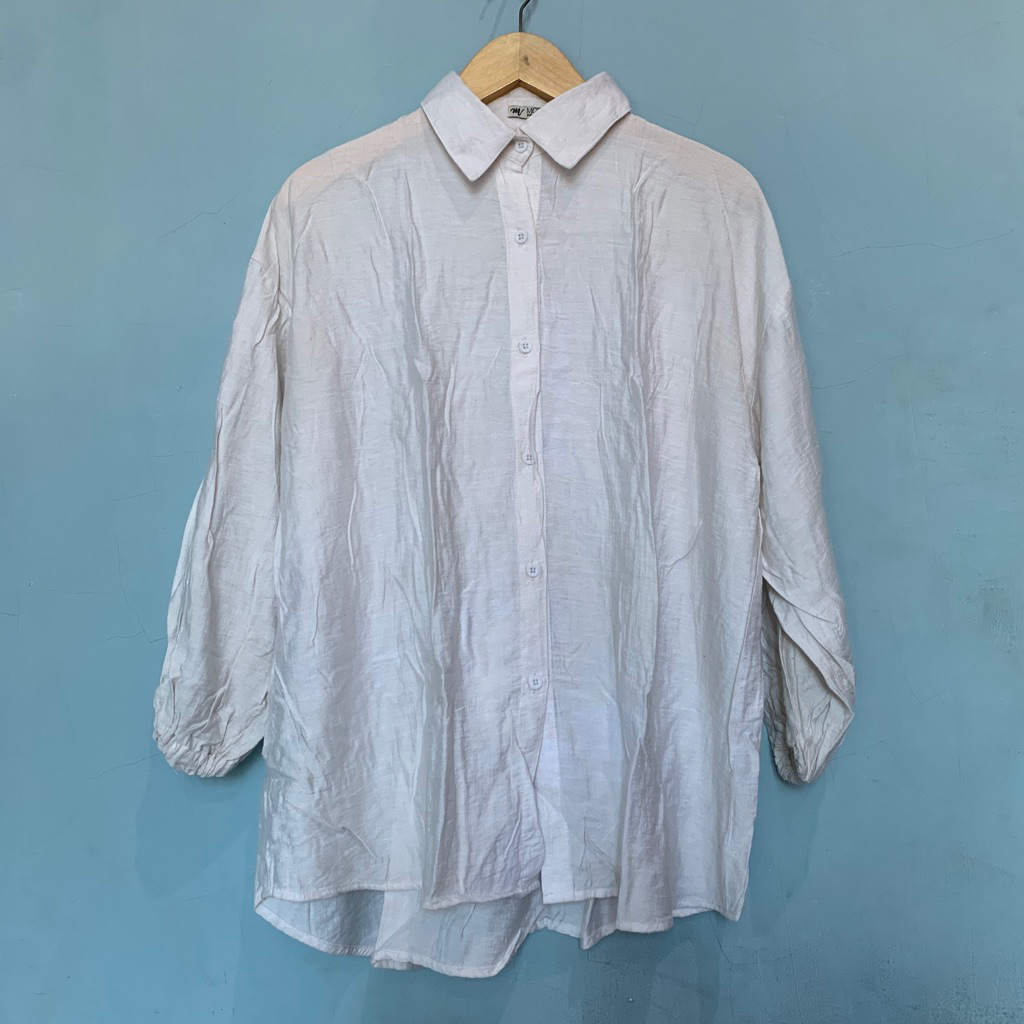 PL kemeja putih wanita