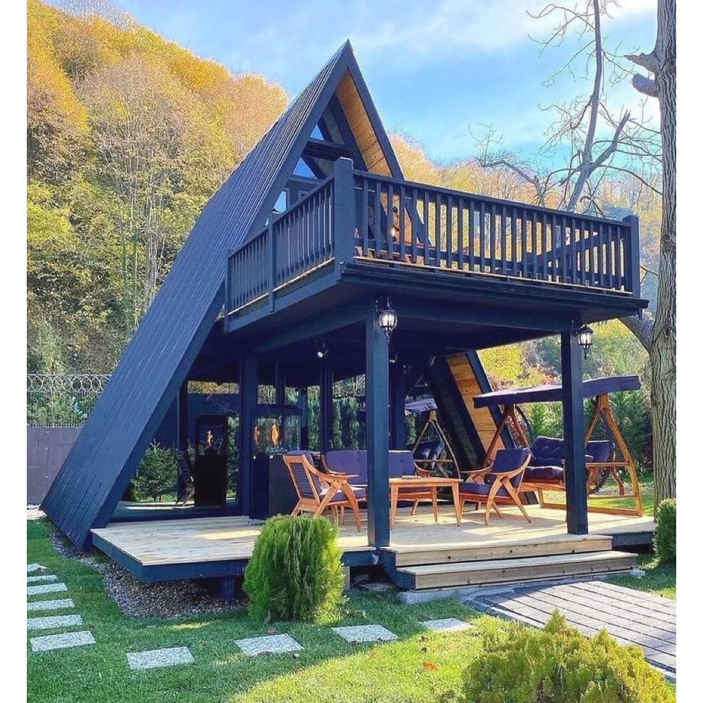 Rumah kayu jati model segitiga modern lantai 2 khas Jepara