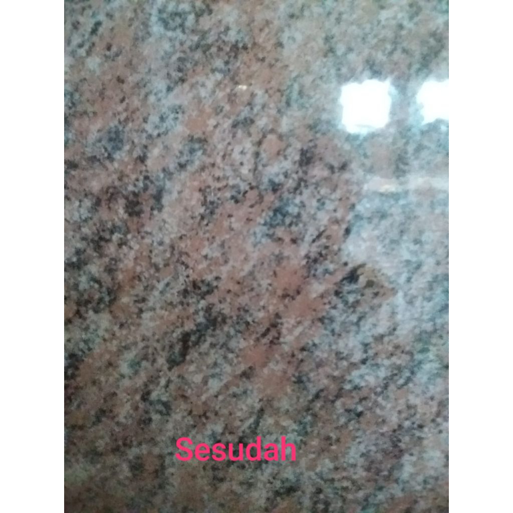 poles dinding granit kamar mandi