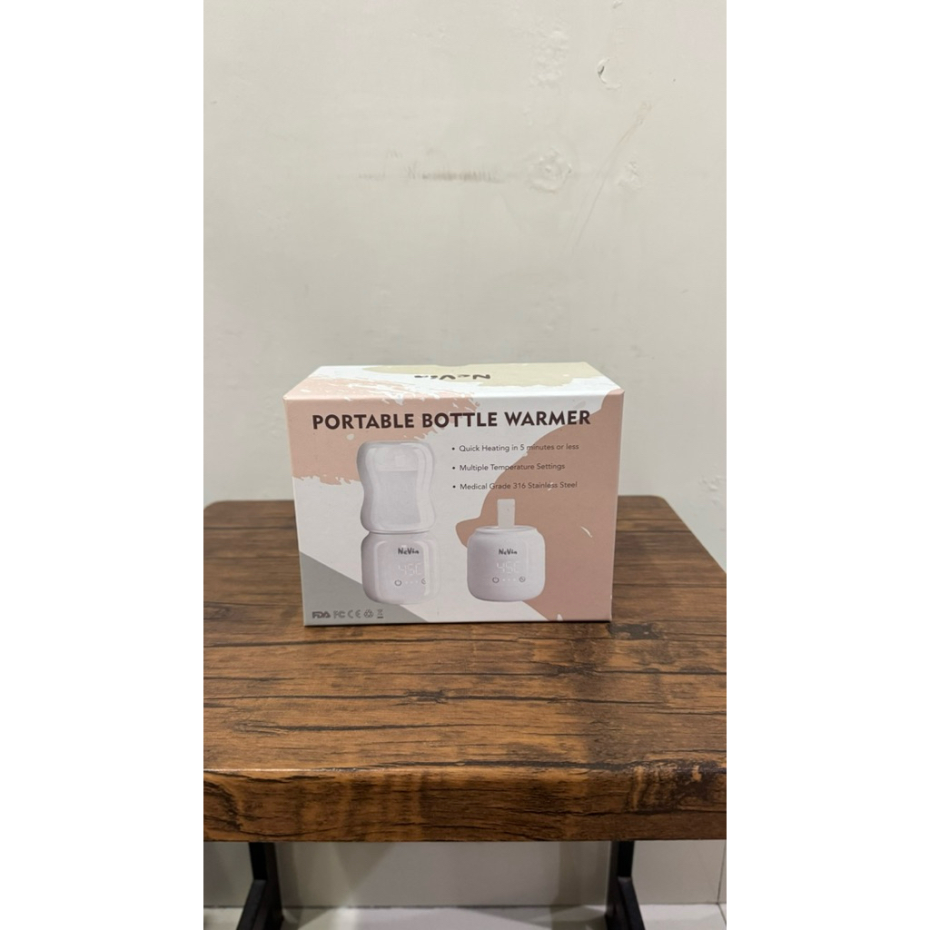 NEW IN BOX Nevia bottle warmer