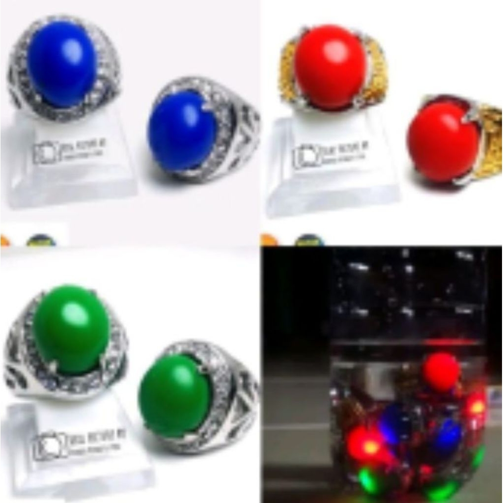 batu cincin merah delima menyala dalam air. merah, biru, hijau