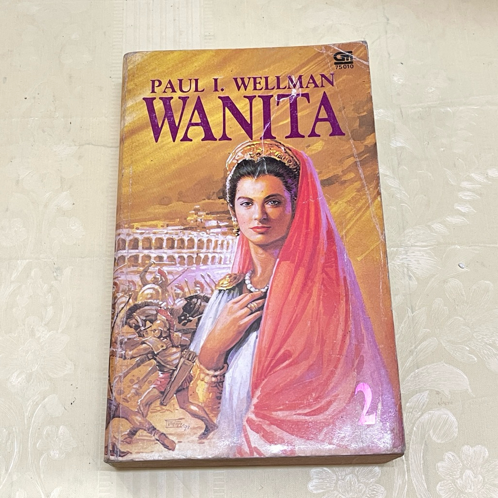 Novel WANITA 2 oleh PAUL I WELLMAN