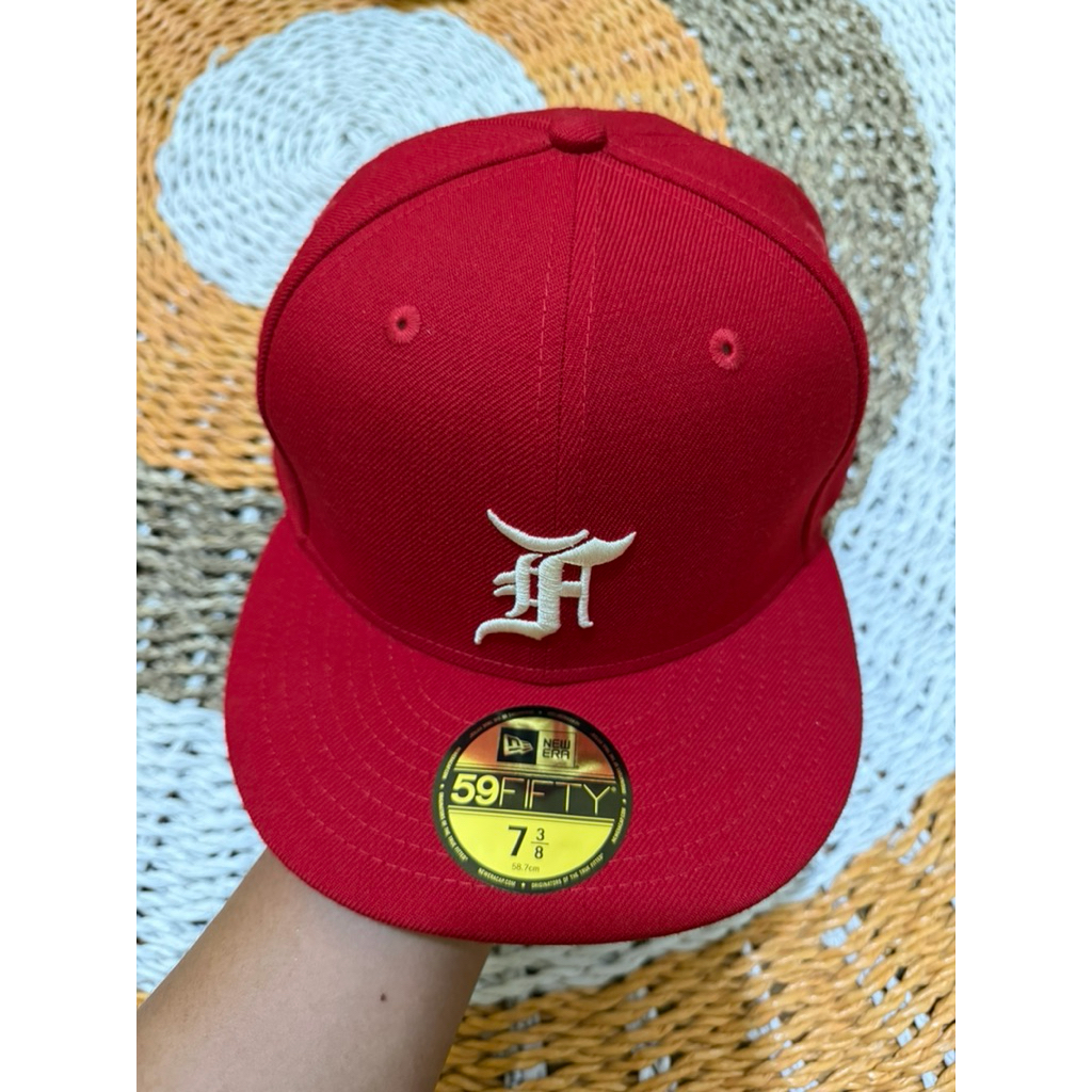 Topi New Era X Fear Of God Essentials