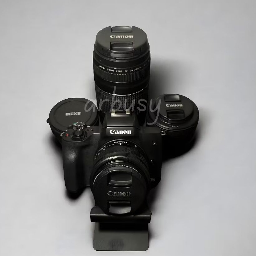 CANON M50 KIT 18-55 MM + LENSA FIX CANON 50MM + LENSA TELE CANON 75-300MM FREE ADAPTER MEIKE