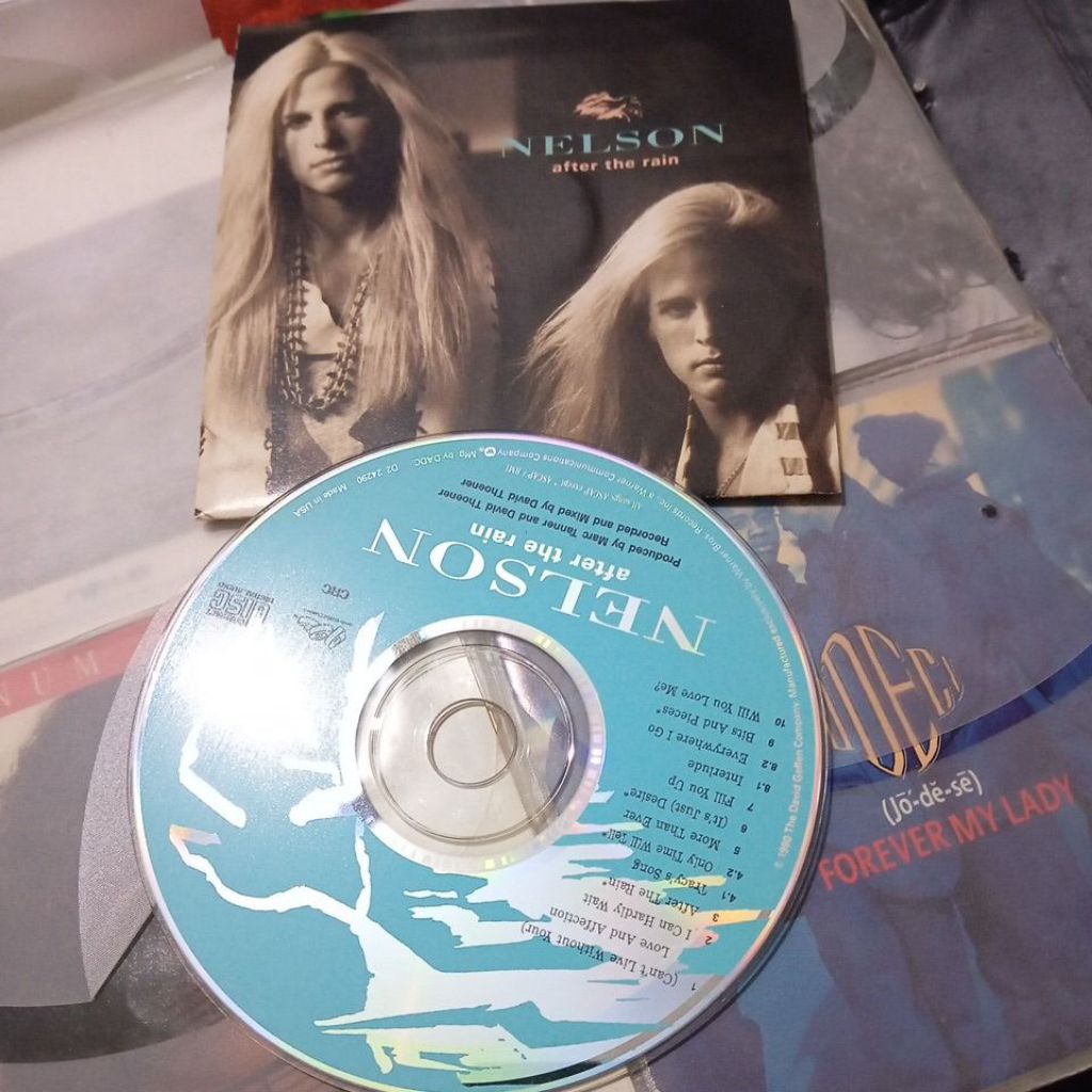cd Nelson after the rain (tanpa cover belakang)