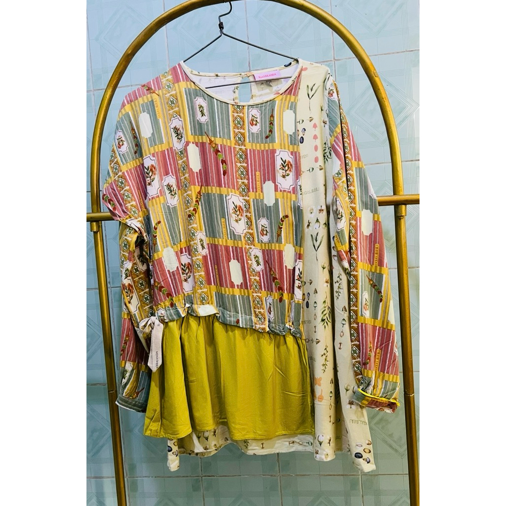 Ria Miranda mula top