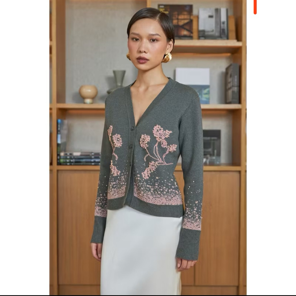 claude marvin cardigan nbu