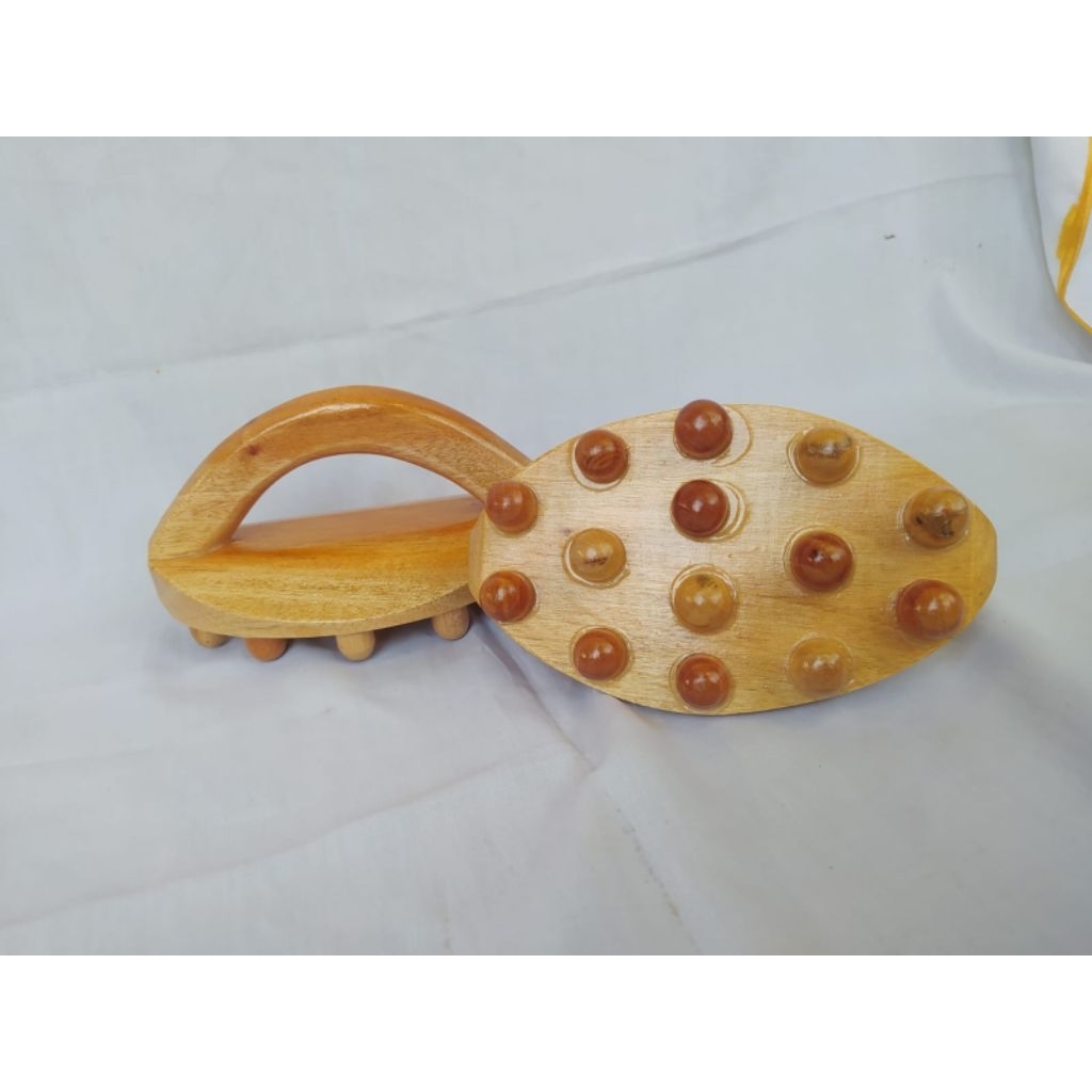 alat pijat guasa model setrika