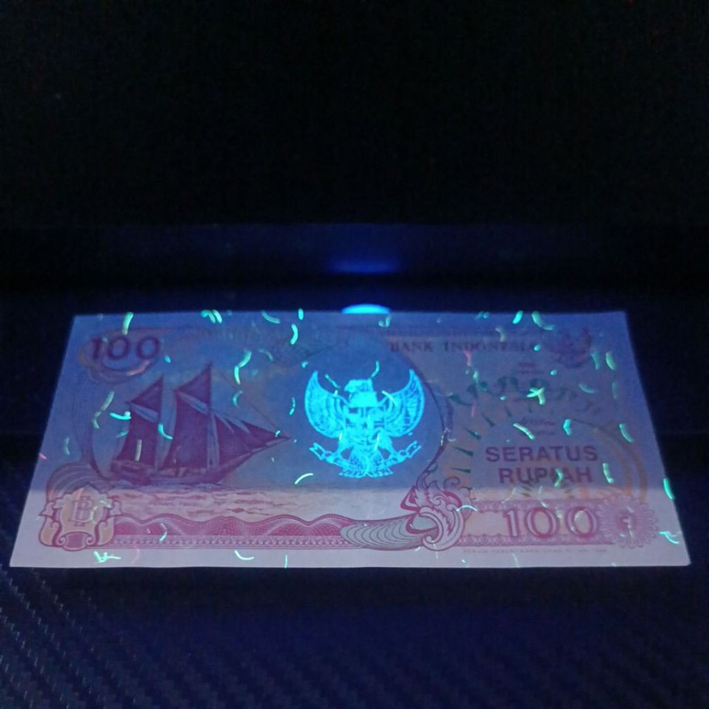 Uang kuno 100 Rupiah Hologram Garuda unik