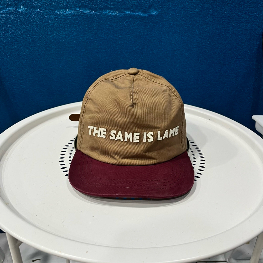 Topi snapback Uniqlo coklat second original