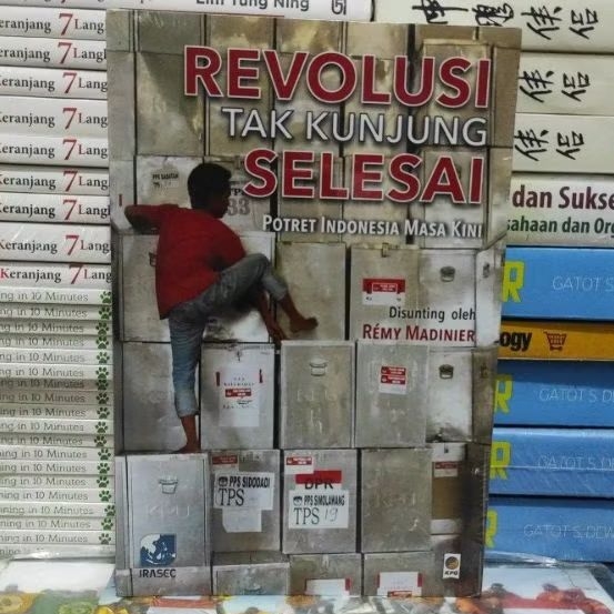 BUKU ORIGINAL REVOLUSI TAK KUNJUNG SELESAI REMY MADINIER