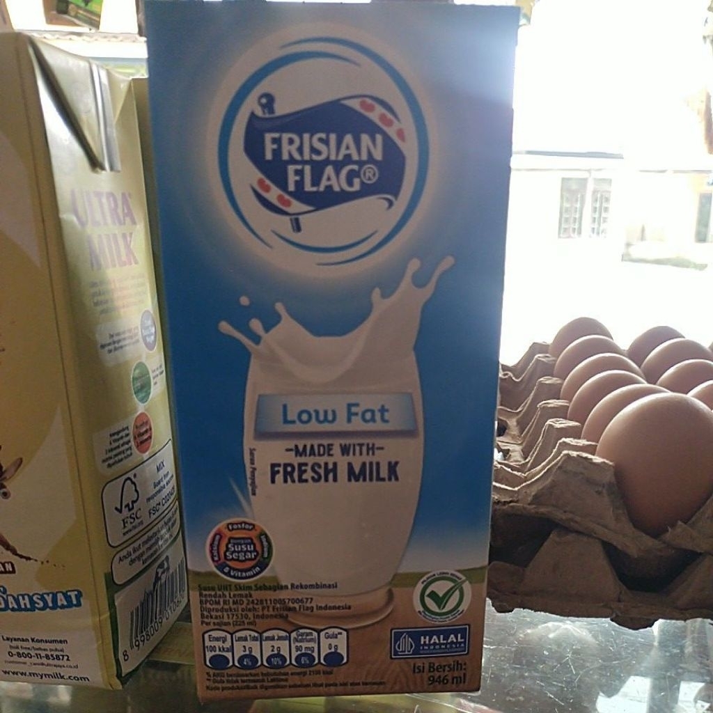 susu UHT Frisian Flag Low Fat 1000 ml