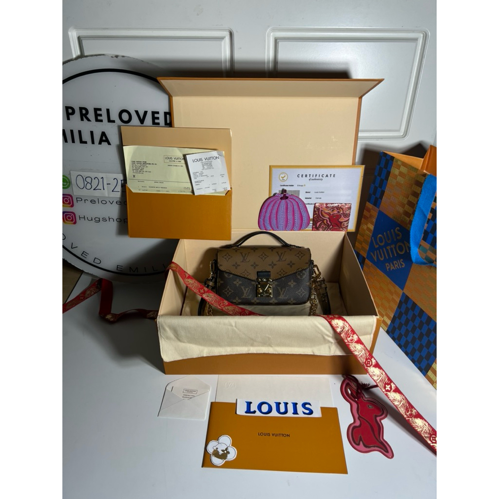 preloved rec 2024 Pochette metis east west monogram reverse authentic