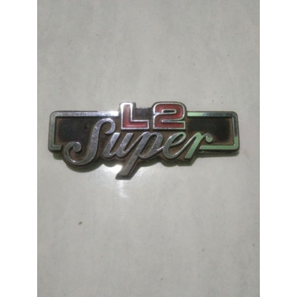satu biji emblem tutup aki yamaha l2super ori bekas ready