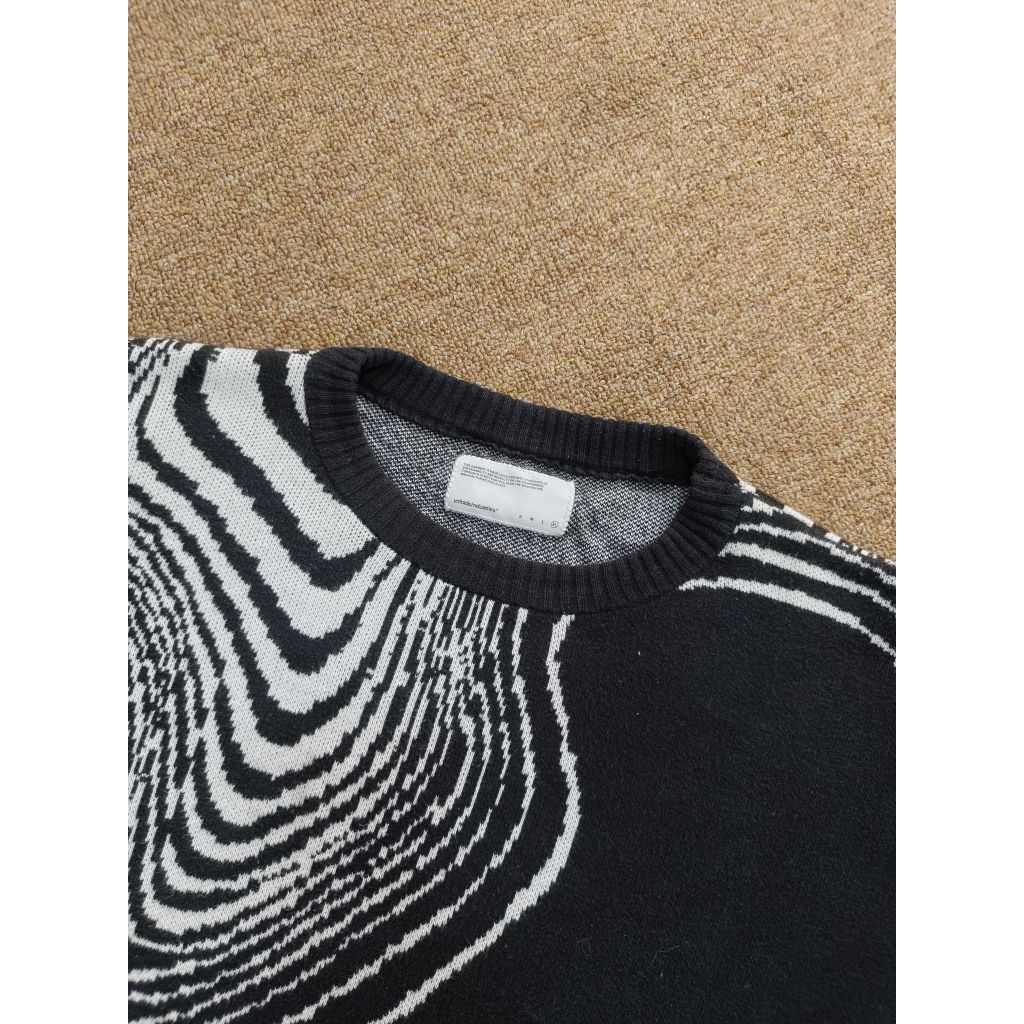 unfolds knitwear sweater