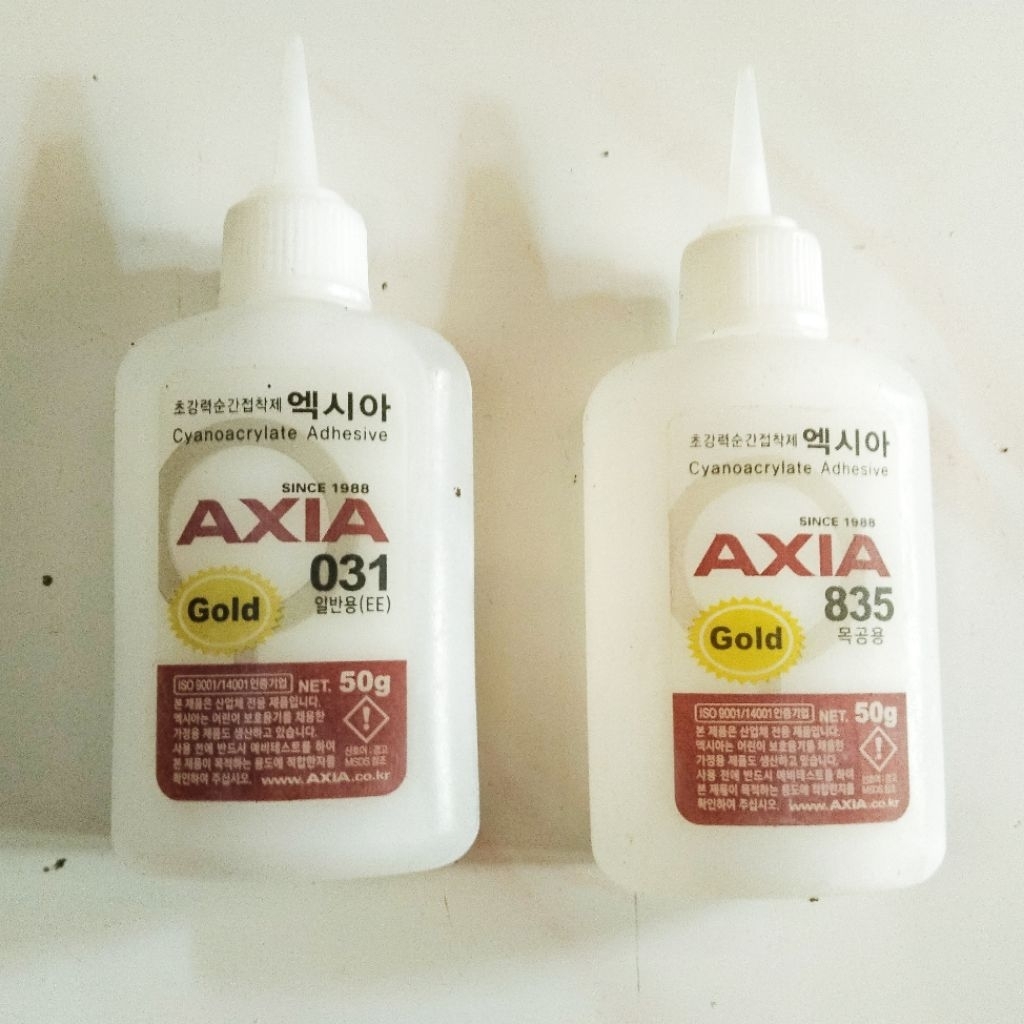 Lem Axia untuk gitar dll