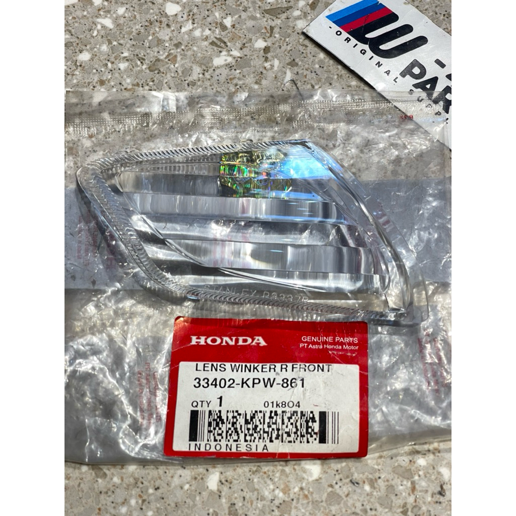 MIKA KACA LAMPU SEIN DEPAN KANAN KIRANA 125 ORIGINAL AHM 33402 KPW 861