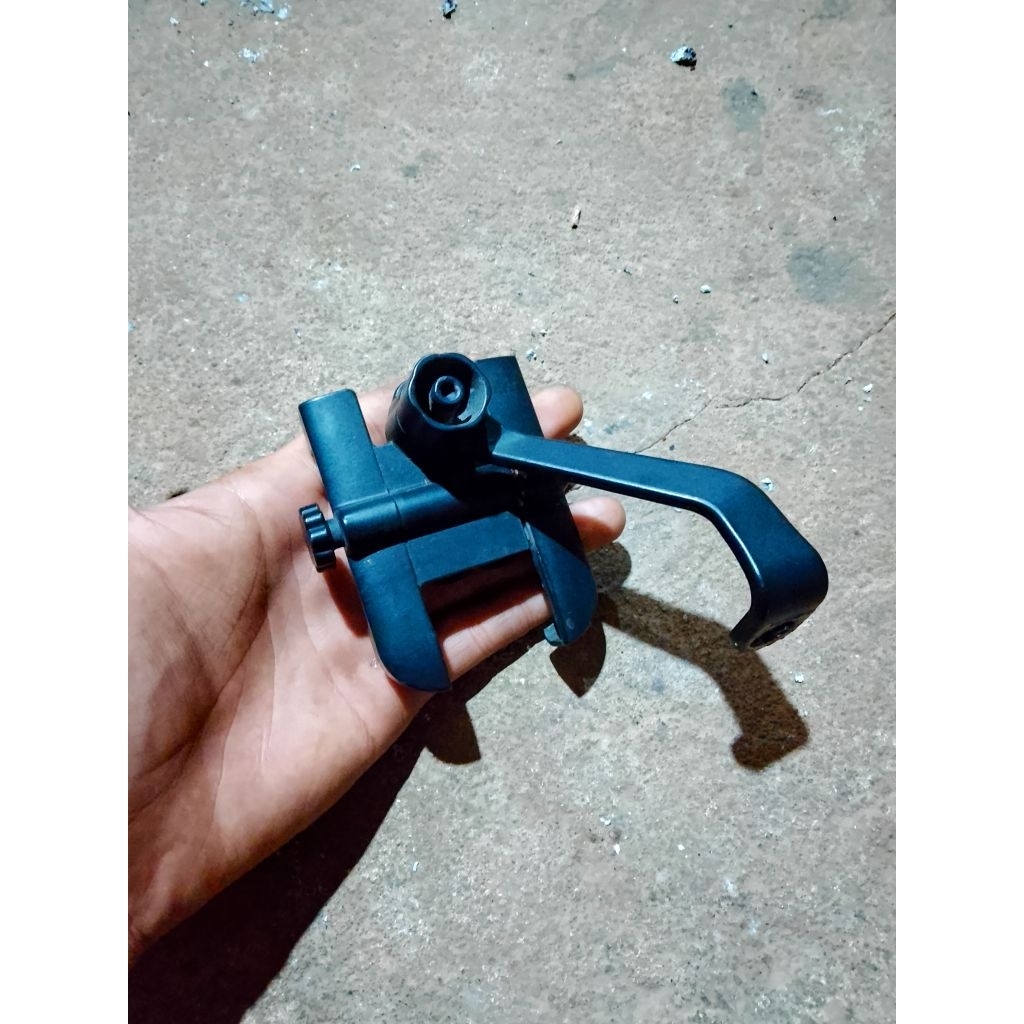 holder hp spion motor bekas