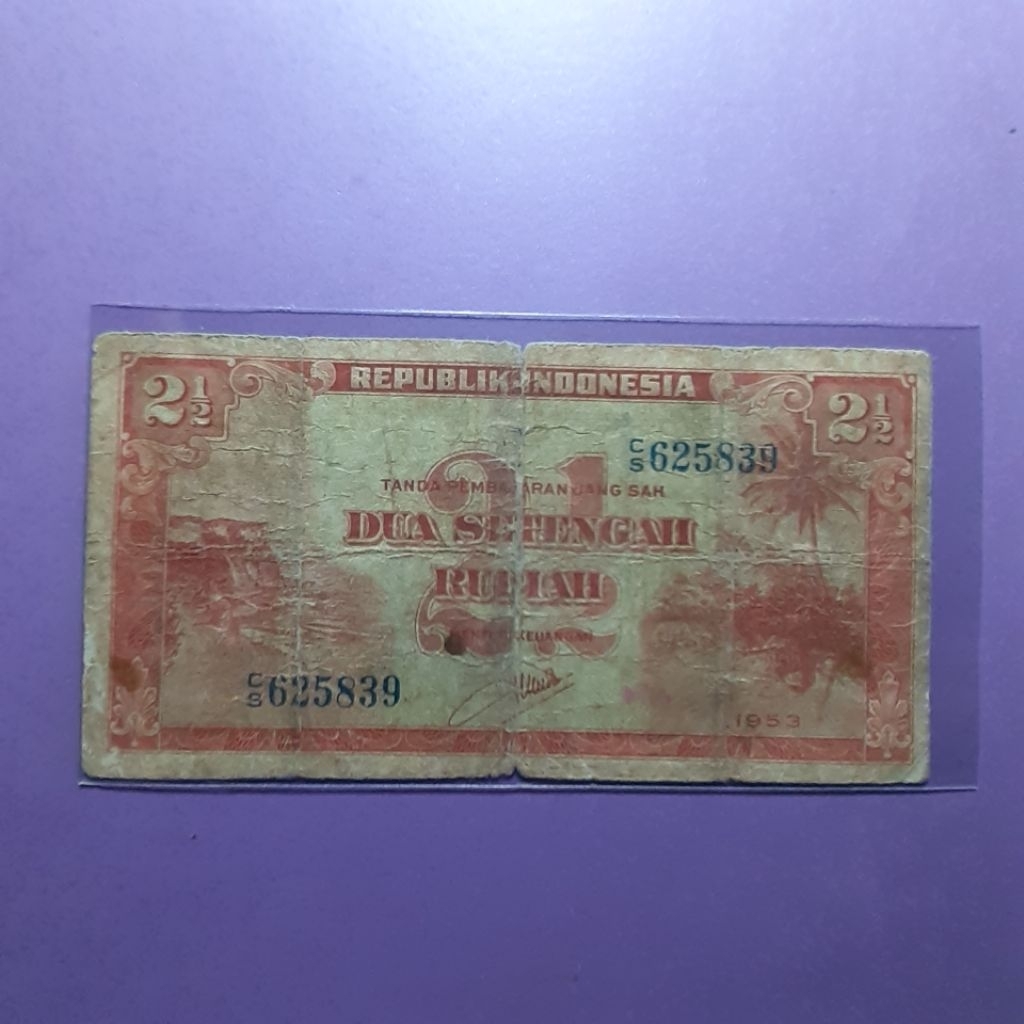 uang kuno 2,5 rupiah pemandangan