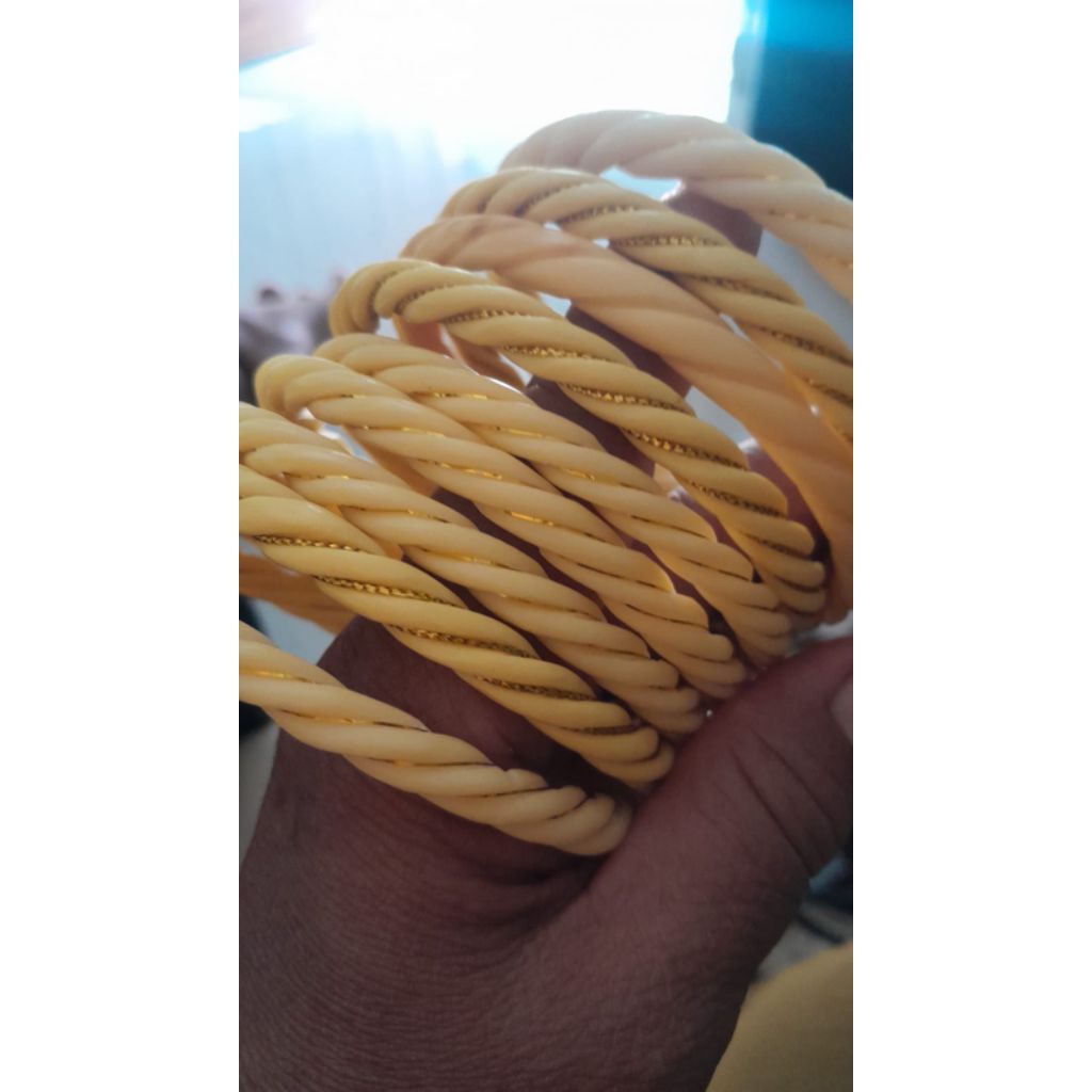 gelang gading serbuk lilit benang emas