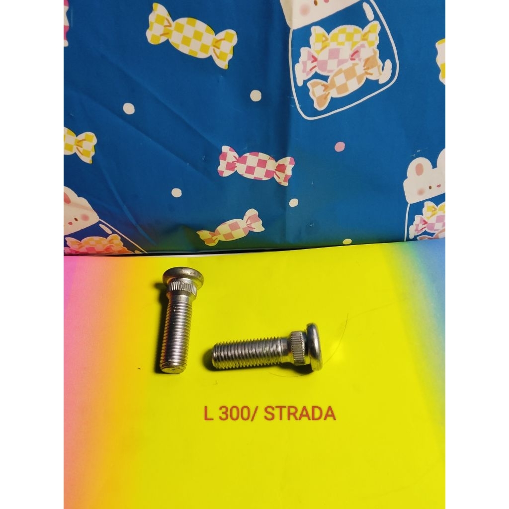 BAUT RODA MITSUBISHI L 300/ STRADA  L 200. PANJANG 4 CINTI . SEPASANG ORIGINAL ASLI