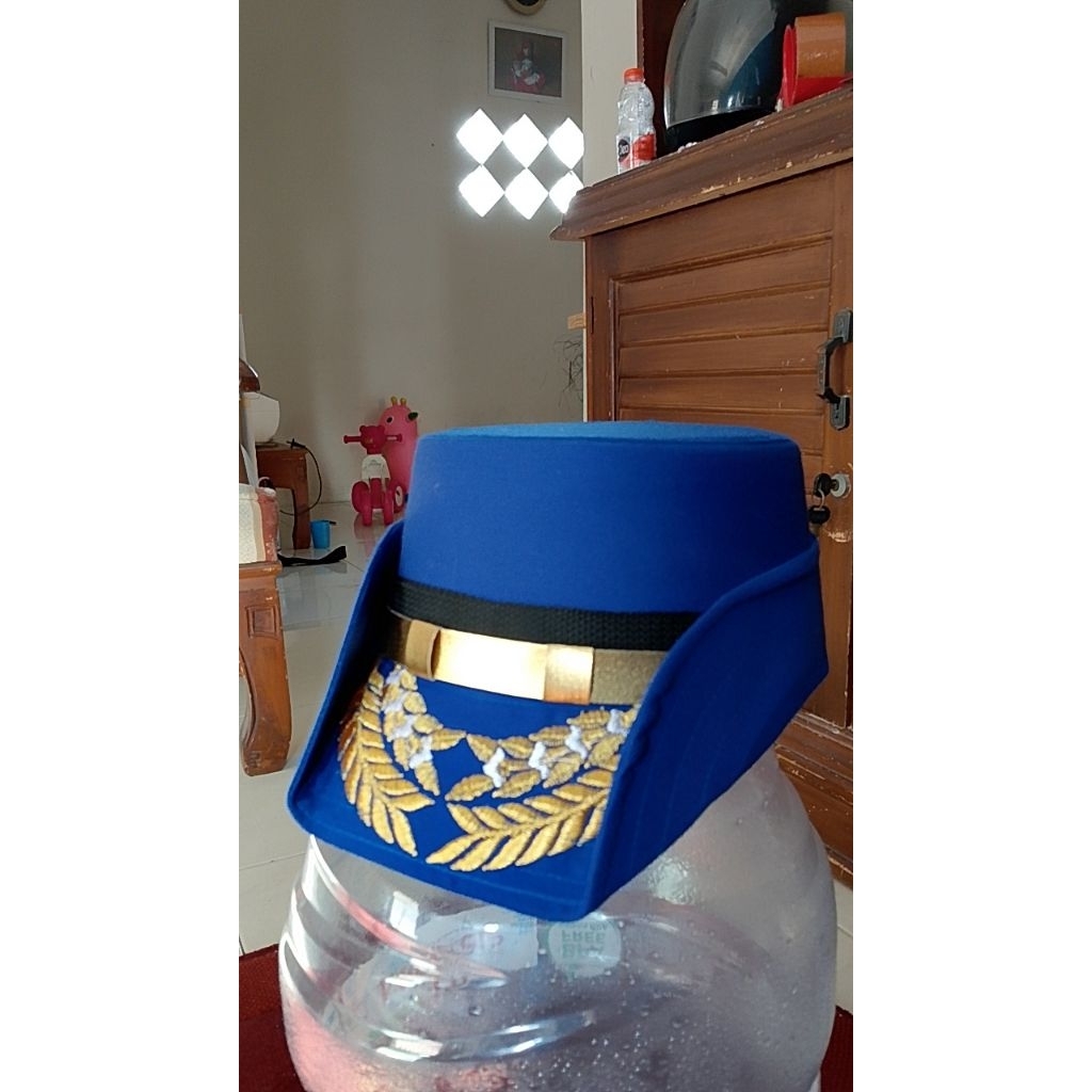 topi kowad biru