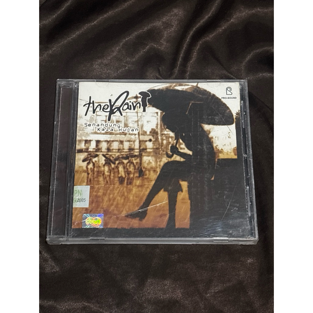 CD ALBUM THE RAIN - SENANDUNG KALA HUJAN ORIGINAL