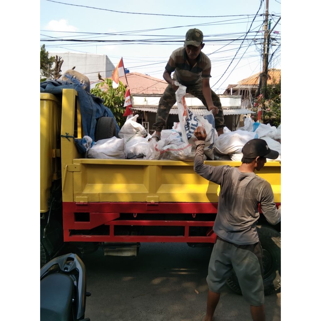 Angkut puing bangunan engkel