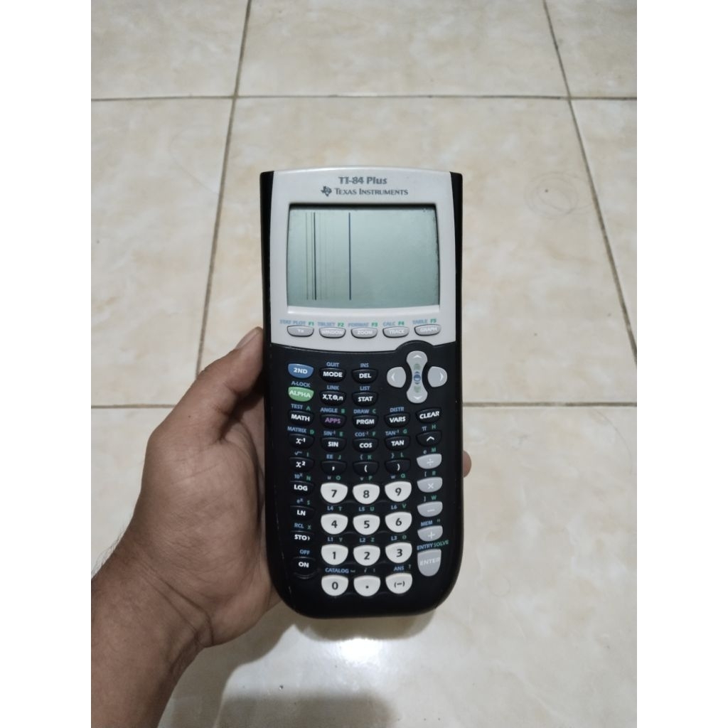TEXAS INSTRUMENTS TI 84 PLUS USA minus