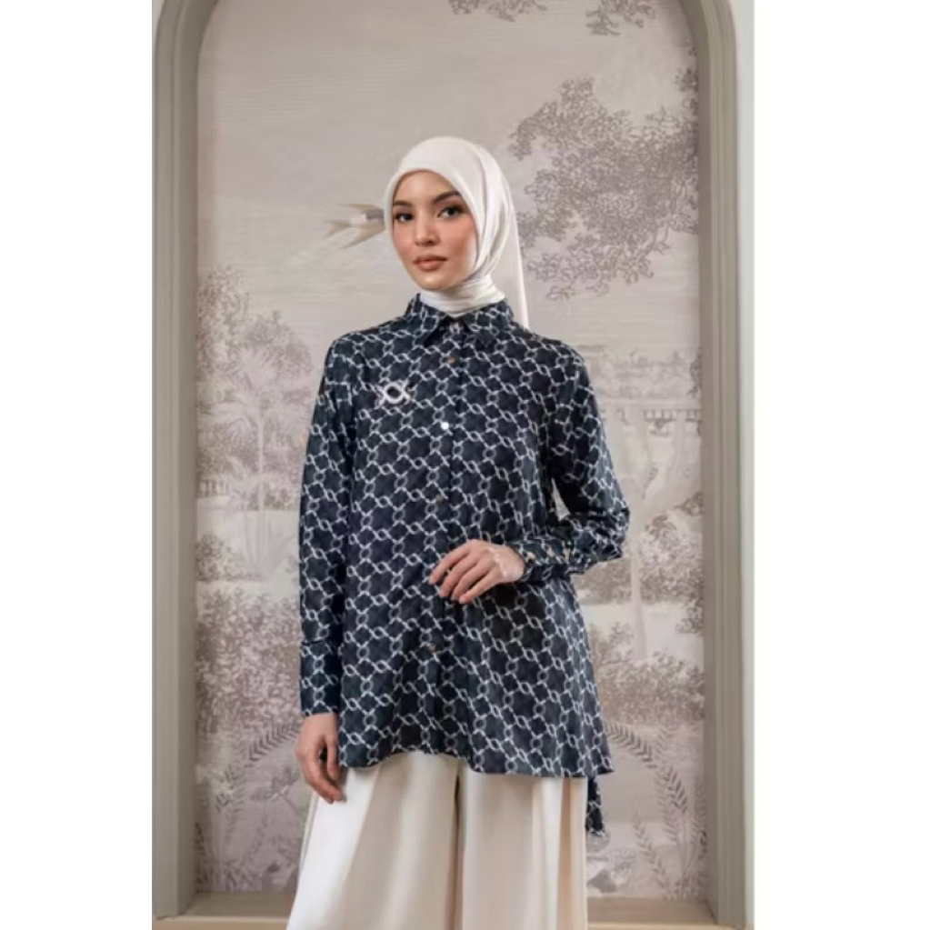 Wearing Klamby monogram pleated PL