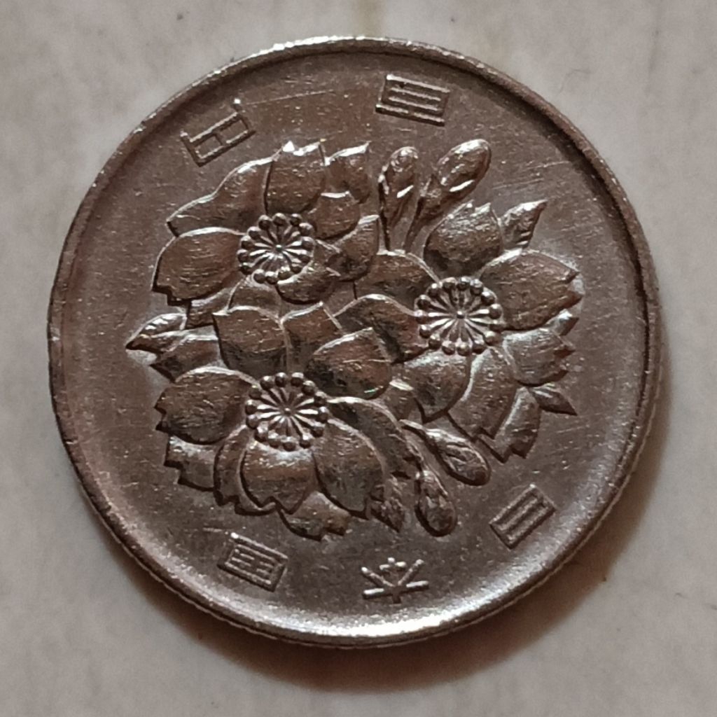 koin Jepang 100 yen tahun 1988..