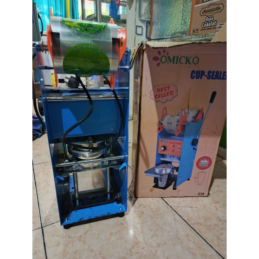 Omicko pressan cup sealer second