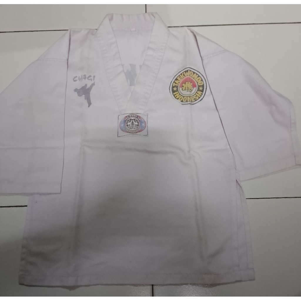 stelan baju taekwondo bekas pakai