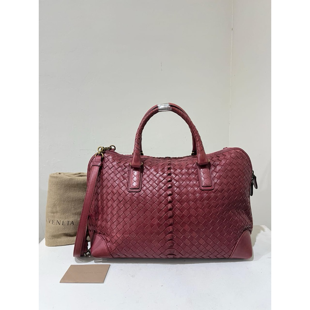Reprice sale Bottega Veneta red sling bag .