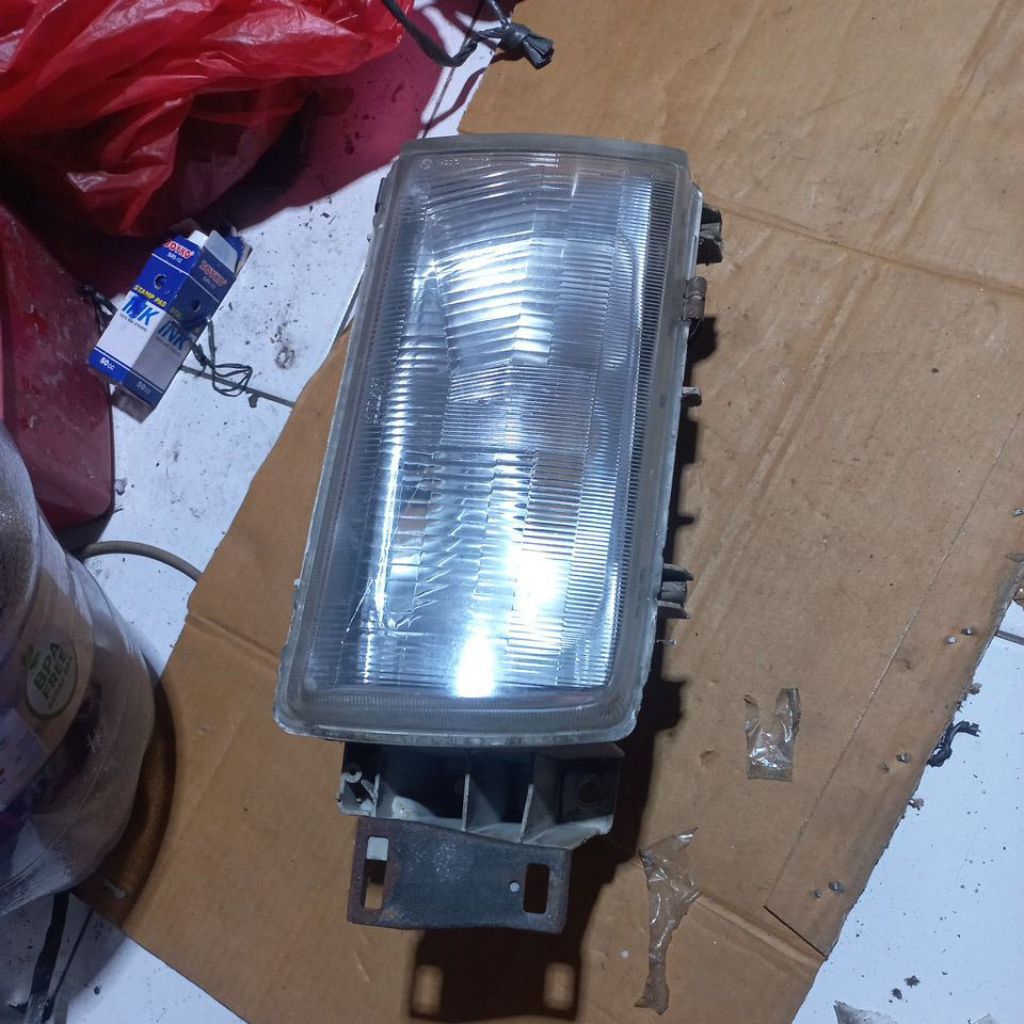 HEADLAMP MAZDA 323 1986 sd 1987 Original