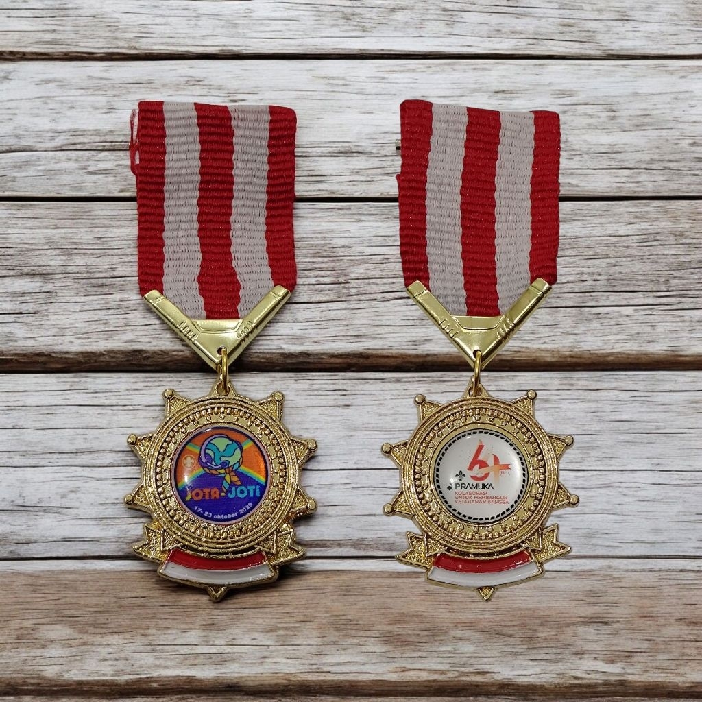 pin tiska logam even jota-joti dan hut 64 2025